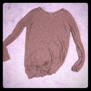 A sweater that is brown